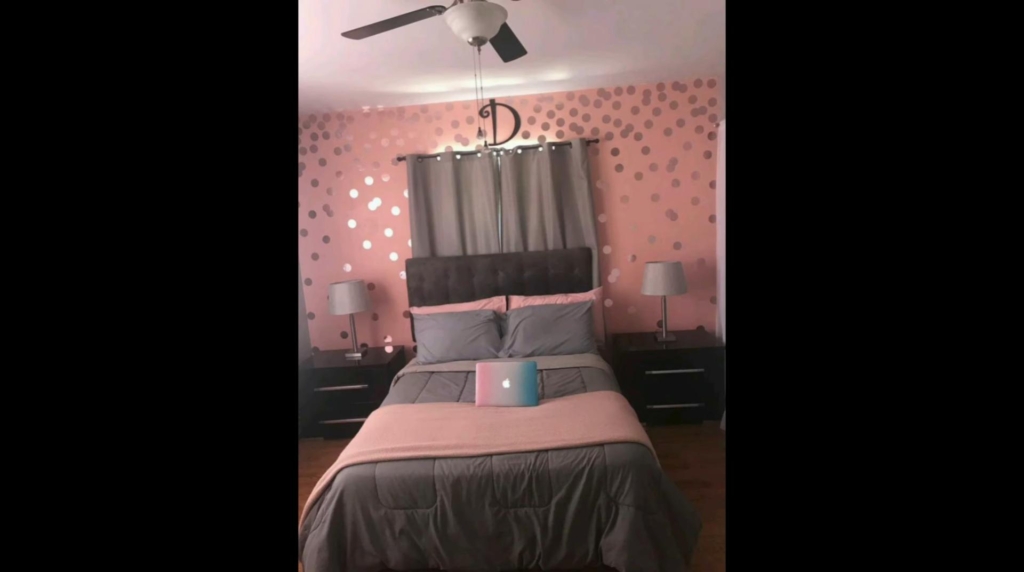 Light pink with black bedroom walls